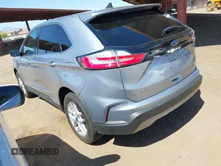 2021 Ford Edge SEL z VIN 2FMPK4J98MBA50772, wystawiony jako IAAI lot #42224052 z przebiegiem 76 061 mil mil oraz . Historia ofert i sprzedaży dostępna na DreamBid. Obrazek 3.