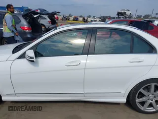2014 Mercedes-Benz C 250 Sport with VIN WDDGF4HB5EG245388, listed as a IAAI auction lot 42407602 with 96,415 mi miles and . Bid and sale history available at DreamBid. Image 15.