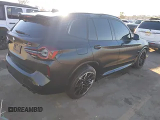 2024 BMW X3 M with VIN 5YM13EC03R9V14879, listed as a IAAI auction lot 41266018 with 21,055 mi miles. Bid and sale history available at carsss.com. Image 4.