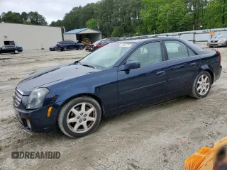 2003 Cadillac CTS with VIN 1G6DM57N030164540, listed as a Copart auction lot 57902175 with 156,457 mi miles and Salvage title. Bid and sale history available at DreamBid. Image 1.