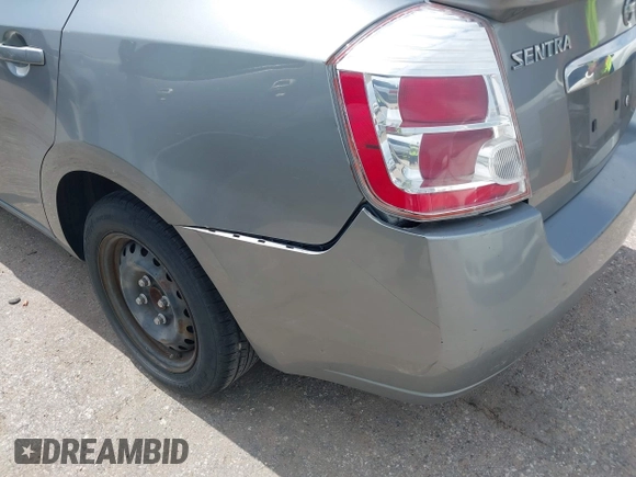 2012 Nissan Sentra S with VIN 3N1AB6AP8CL677739, listed as a IAAI auction lot 42466556 with 166,199 mi miles and . Bid and sale history available at DreamBid. Image 14.