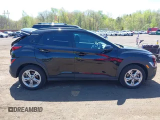 2023 Hyundai Kona SEL with VIN KM8K6CAB3PU012120, listed as a IAAI auction lot 42134639 with 15,057 mi miles and . Bid and sale history available at DreamBid. Image 13.