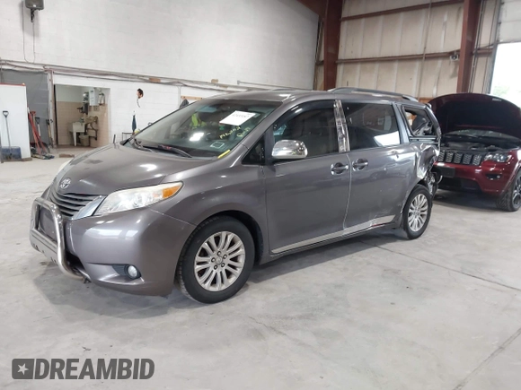 2011 Toyota Sienna XLE AAS with VIN 5TDYK3DC0BS063232, listed as a IAAI auction lot 42433187 with 198,252 mi miles and . Bid and sale history available at DreamBid. Image 2.
