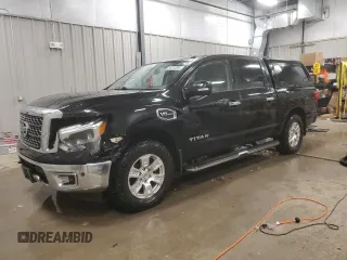 2017 Nissan Titan SL z VIN 1N6AA1E5XHN565394, wystawiony jako Copart lot #84414854 z przebiegiem 115 283 mil mil oraz Szkoda całkowita • Salvage title. Historia ofert i sprzedaży dostępna na DreamBid. Obrazek 1.