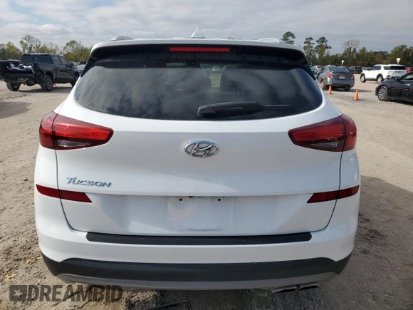 2020 Hyundai Tucson Sport with VIN KM8J33ALXLU093849, listed as a Copart auction lot 82670704 with 87,584 mi miles and Clean title. Bid and sale history available at DreamBid. Image 6.