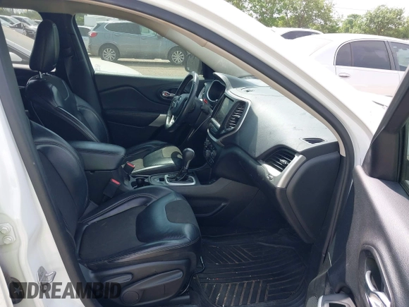 2018 Jeep Cherokee Latitude Plus with VIN 1C4PJLLX2JD557198, listed as a IAAI auction lot 41908907 with 155,195 mi miles and . Bid and sale history available at DreamBid. Image 5.