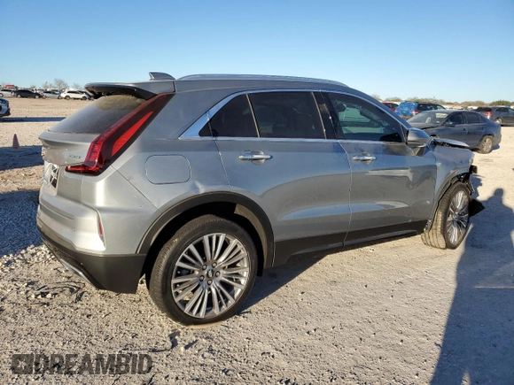 2024 Cadillac XT4 FWD Premium Luxury with VIN 1GYFZCR47RF213944, listed as a Copart auction lot 87674675 with 1,606 mi miles and Salvage title. Bid and sale history available at DreamBid. Image 3.