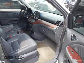 2007 Honda Odyssey EX-L with VIN 5FNRL38747B121059, listed as a IAAI auction lot 42211056 with 171,838 mi miles and . Bid and sale history available at DreamBid. Image 5.