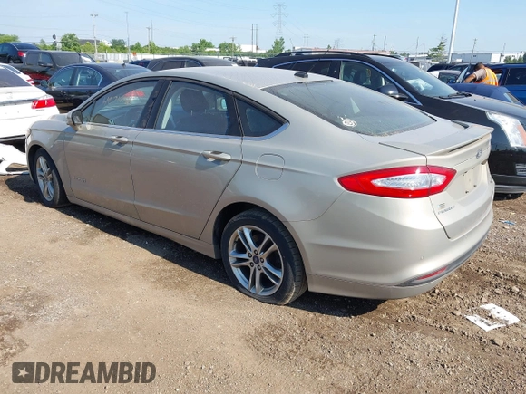 2015 Ford Fusion SE Hybrid with VIN 3FA6P0LU7FR243498, listed as a IAAI auction lot 42719986 with 345,098 mi miles and . Bid and sale history available at DreamBid. Image 3.