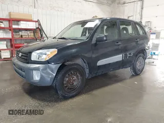 2001 Toyota RAV4 with VIN JTEGH20V810001120, listed as a IAAI auction lot 42671496 with 235,580 mi miles and . Bid and sale history available at DreamBid. Image 2.