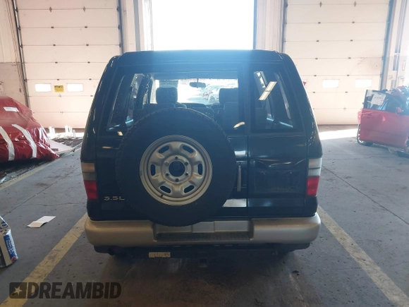 2001 Isuzu Trooper S with VIN JACDJ58X917J09299, listed as a IAAI auction lot 41296724 with 131,829 mi miles and . Bid and sale history available at DreamBid. Image 16.