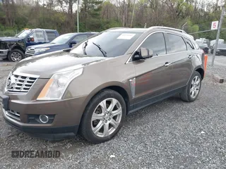 2014 Cadillac SRX Performance Collection with VIN 3GYFNCE33ES570472, listed as a IAAI auction lot 41971511 with 200,811 mi miles. Bid and sale history available at carsss.com. Image 20.