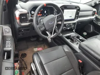 2023 Ford F-150 Raptor with VIN 1FTFW1RG4PFB17389, listed as a Copart auction lot 51703635 with 19,772 mi miles and Salvage Title. Bid and sale history available at DreamBid. Image 8.