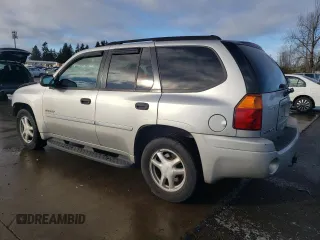 2006 GMC Envoy SLE with VIN 1GKDT13S262327772, listed as a Copart auction lot 85270134 with 242,390 mi miles and Salvage Title. Bid and sale history available at carsss.com. Image 2.