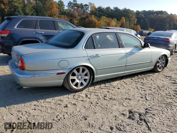 2005 Jaguar XJ with VIN SAJWA79C15SG48962, listed as a Copart auction lot 75674034 with 0 mi miles and Salvage Title. Bid and sale history available at carsss.com. Image 3.
