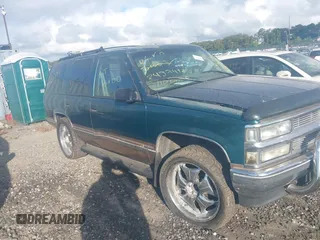1998 Chevrolet Tahoe z VIN 1GNEK13R1WJ302987, wystawiony jako IAAI lot #40491593 z przebiegiem Nie podano mil oraz . Historia ofert i sprzedaży dostępna na DreamBid. Obrazek 1.