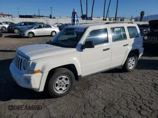 2009 Jeep Patriot with VIN 1J8FT28A39D154503, listed as a Copart auction lot 87726155 with 96,958 mi miles and Salvage title. Bid and sale history available at DreamBid. Image 1.