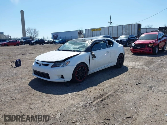 2012 Scion tC with VIN JTKJF5C7XC3029980, listed as a IAAI auction lot 41832490 with 132,140 mi miles. Bid and sale history available at carsss.com. Image 18.