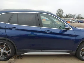 2018 BMW X1 xDrive28i z VIN WBXHT3C36J3H30583, wystawiony jako IAAI lot #42096329 z przebiegiem 43 232 mil mil oraz . Historia ofert i sprzedaży dostępna na DreamBid. Obrazek 14.