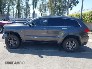 2014 Jeep Grand Cherokee Limited with VIN 1C4RJFBG5EC416620, listed as a IAAI auction lot 41967813 with 161,388 mi miles and . Bid and sale history available at DreamBid. Image 15.