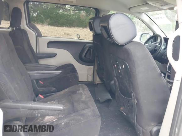 2014 Dodge Grand Caravan American Value with VIN 2C4RDGBG0ER168085, listed as a IAAI auction lot 42020959 with 213,383 mi miles and . Bid and sale history available at DreamBid. Image 8.