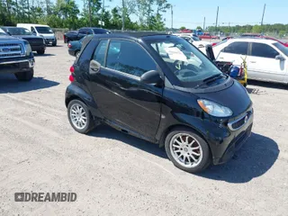 2014 Smart fortwo Passion z VIN WMEEK3BA6EK736171, wystawiony jako IAAI lot #42019777 z przebiegiem 163 376 mil mil oraz . Historia ofert i sprzedaży dostępna na DreamBid. Obrazek 1.