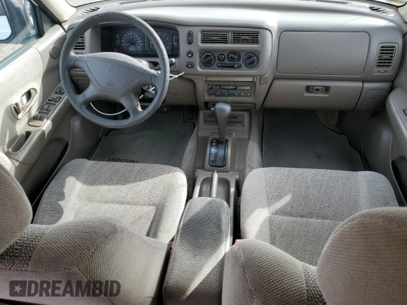 1999 Mitsubishi Montero LS z VIN JA4LS31H2XP037110, wystawiony jako Copart lot #45447485 z przebiegiem 166 942 mil mil oraz Szkoda całkowita • Salvage title. Historia ofert i sprzedaży dostępna na DreamBid. Obrazek 8.