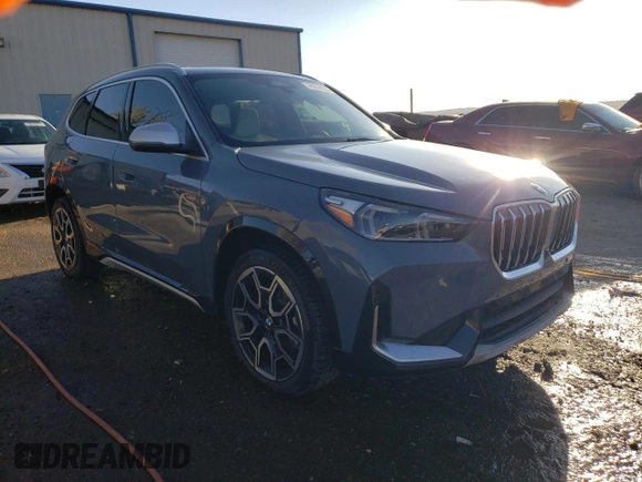 2024 BMW X1 xDrive28i with VIN WBX73EF00R5Z58004, listed as a Copart auction lot 49554055 with 4,053 mi miles and Salvage title. Bid and sale history available at DreamBid. Image 4.