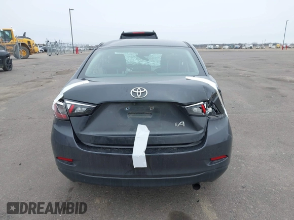 2018 Toyota Yaris with VIN 3MYDLBYV9JY321158, listed as a IAAI auction lot 41937684 with 85,020 mi miles and . Bid and sale history available at DreamBid. Image 16.