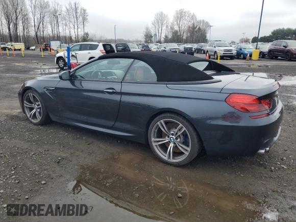 2013 BMW M6 z VIN WBSLZ9C55DDZ77804, wystawiony jako Copart lot #54121185 z przebiegiem 66 286 mil mil oraz Czysty tytuł • Clean title. Historia ofert i sprzedaży dostępna na DreamBid. Obrazek 2.