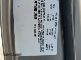 2003 Cadillac DeVille DTS z VIN 1G6KF57963U125853, wystawiony jako Copart lot #42559975 z przebiegiem Nie podano mil oraz Szkody całkowita. Historia ofert i sprzedaży dostępna na DreamBid. Obrazek 13.