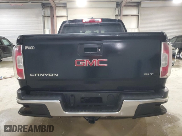2016 GMC Canyon 2WD SLT with VIN 1GTG5DE39G1100516, listed as a Copart auction lot 87648455 with 243,815 mi miles and Salvage Title. Bid and sale history available at carsss.com. Image 6.
