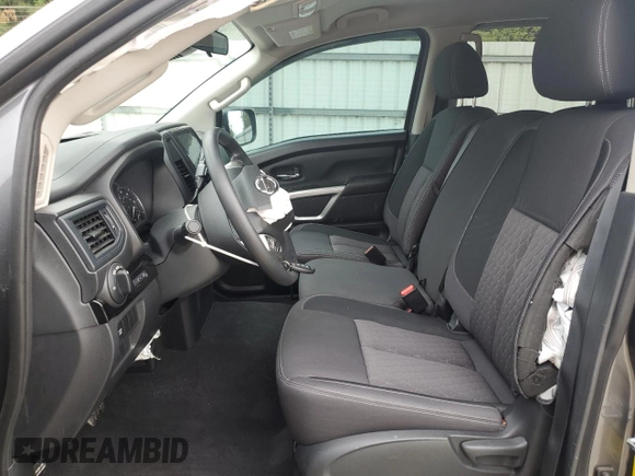 2022 Nissan Titan S with VIN 1N6AA1EC9NN106299, listed as a Copart auction lot 58061355 with 49,910 mi miles and Salvage title. Bid and sale history available at DreamBid. Image 7.
