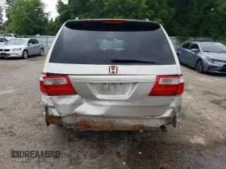 2007 Honda Odyssey EX with VIN 5FNRL38427B513477, listed as a Copart auction lot 62457695 with 216,977 mi miles and Salvage title. Bid and sale history available at DreamBid. Image 6.