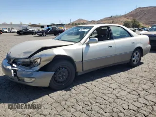 1999 Lexus ES 300 with VIN JT8BF28G0X5063518, listed as a Copart auction lot 66399035 with 116,604 mi miles and Salvage title. Bid and sale history available at DreamBid. Image 1.