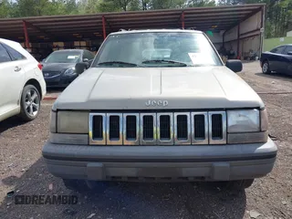1994 Jeep Grand Cherokee Laredo with VIN 1J4GZ58Y0RC200247, listed as a IAAI auction lot 41781078 with 217,698 mi miles. Bid and sale history available at carsss.com. Image 6.