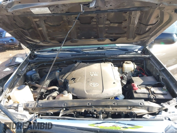 2014 Toyota Tacoma with VIN 3TMLU4EN3EM143882, listed as a IAAI auction lot 40657975 with 125,008 mi miles. Bid and sale history available at carsss.com. Image 10.