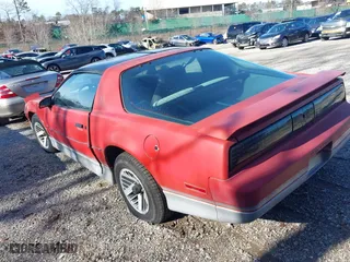 1985 Pontiac Firebird Trans Am with VIN 1G2FW87H3FN208733, listed as a IAAI auction lot 41705988 with 87,906 mi miles. Bid and sale history available at carsss.com. Image 3.