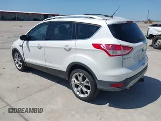 2013 Ford Escape Titanium with VIN 1FMCU0J9XDUA33872, listed as a IAAI auction lot 42009286 with 161,677 mi miles. Bid and sale history available at carsss.com. Image 3.