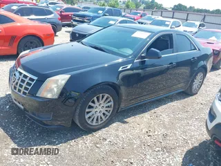 2013 Cadillac CTS Luxury with VIN 1G6DE5E55D0118722, listed as a IAAI auction lot 42448616 with 131,906 mi miles and . Bid and sale history available at DreamBid. Image 2.
