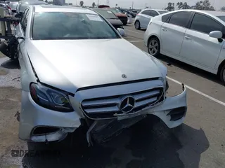2018 Mercedes-Benz E 300 with VIN WDDZF4JB4JA427194, listed as a IAAI auction lot 42610082 with Not provided miles and . Bid and sale history available at DreamBid. Image 12.