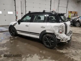 2013 MINI Countryman S ALL4 with VIN WMWZC5C56DWM15763, listed as a Copart auction lot 51165565 with 165,494 mi miles and Salvage Title. Bid and sale history available at DreamBid. Image 2.