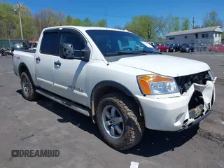 2012 Nissan Titan SV with VIN 1N6AA0EC0CN307743, listed as a IAAI auction lot 42085082 with 187,506 mi miles. Bid and sale history available at carsss.com. Image 1.