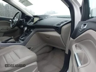 2014 Ford Escape SE with VIN 1FMCU0GX6EUD43105, listed as a IAAI auction lot 41728686 with 95,729 mi miles. Bid and sale history available at carsss.com. Image 5.