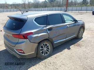 2020 Hyundai Santa Fe SE with VIN 5NMS23AD8LH178541, listed as a IAAI auction lot 41779711 with 86,036 mi miles and . Bid and sale history available at DreamBid. Image 4.