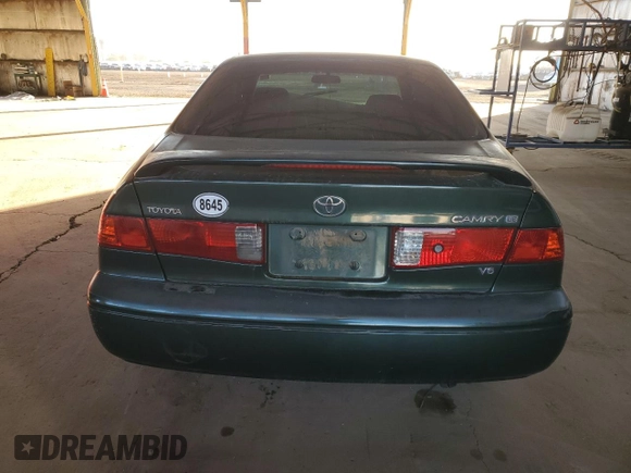 2001 Toyota Camry LE z VIN JT2BF22K510303027, wystawiony jako Copart lot #85090174 z przebiegiem 253 038 mil mil oraz Szkoda całkowita • Salvage title. Historia ofert i sprzedaży dostępna na DreamBid. Obrazek 6.