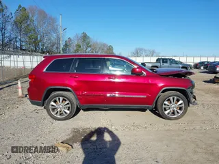 2013 Jeep Grand Cherokee Laredo with VIN 1C4RJEAG3DC631987, listed as a IAAI auction lot 41240182 with 186,193 mi miles. Bid and sale history available at carsss.com. Image 14.