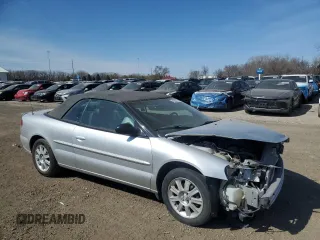2005 Chrysler Sebring GTC with VIN 1C3EL75R85N618422, listed as a Copart auction lot 48548755 with 111,681 mi miles and Salvage Title. Bid and sale history available at DreamBid. Image 4.
