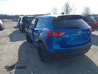 2013 Mazda CX-5 Grand Touring with VIN JM3KE4DE1D0147934, listed as a IAAI auction lot 41869973 with 164,345 mi miles. Bid and sale history available at carsss.com. Image 3.