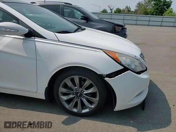 2012 Hyundai Sonata Limited z VIN 5NPEC4AB2CH490212, wystawiony jako Copart lot #59576655 z przebiegiem 144 183 mil mil oraz Szkoda całkowita • Salvage title. Historia ofert i sprzedaży dostępna na DreamBid. Obrazek 13.
